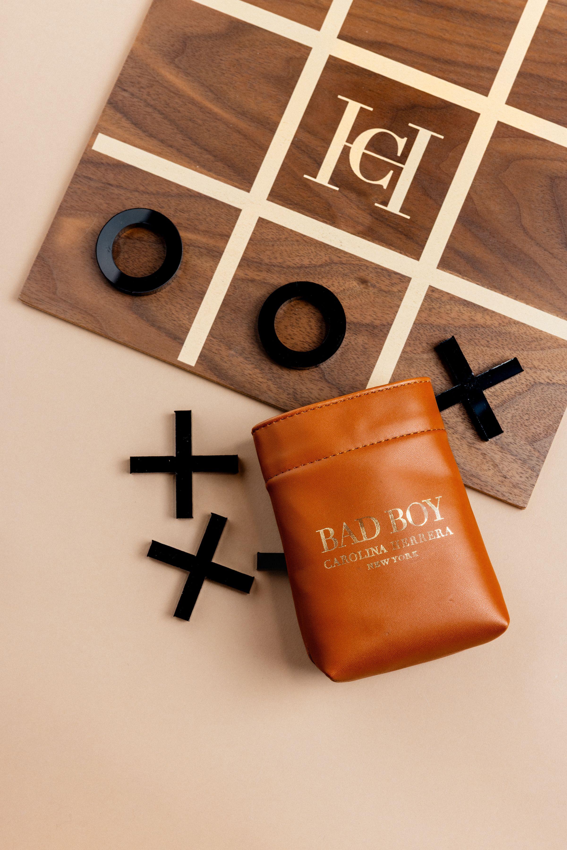 Carolina Hererra Bad Boy Fragrance wooden box with tic tac toe game set