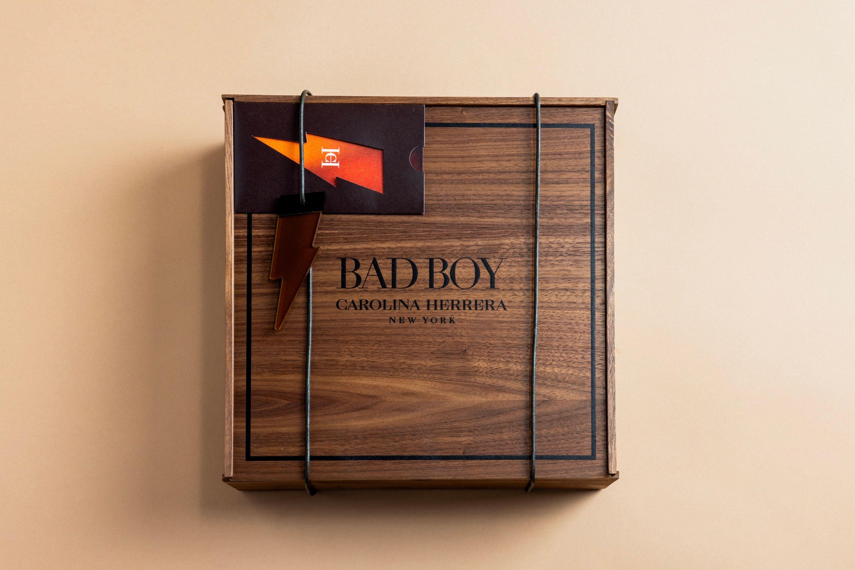 Carolina Hererra Bad Boy Fragrance wooden box with tic tac toe game set inside