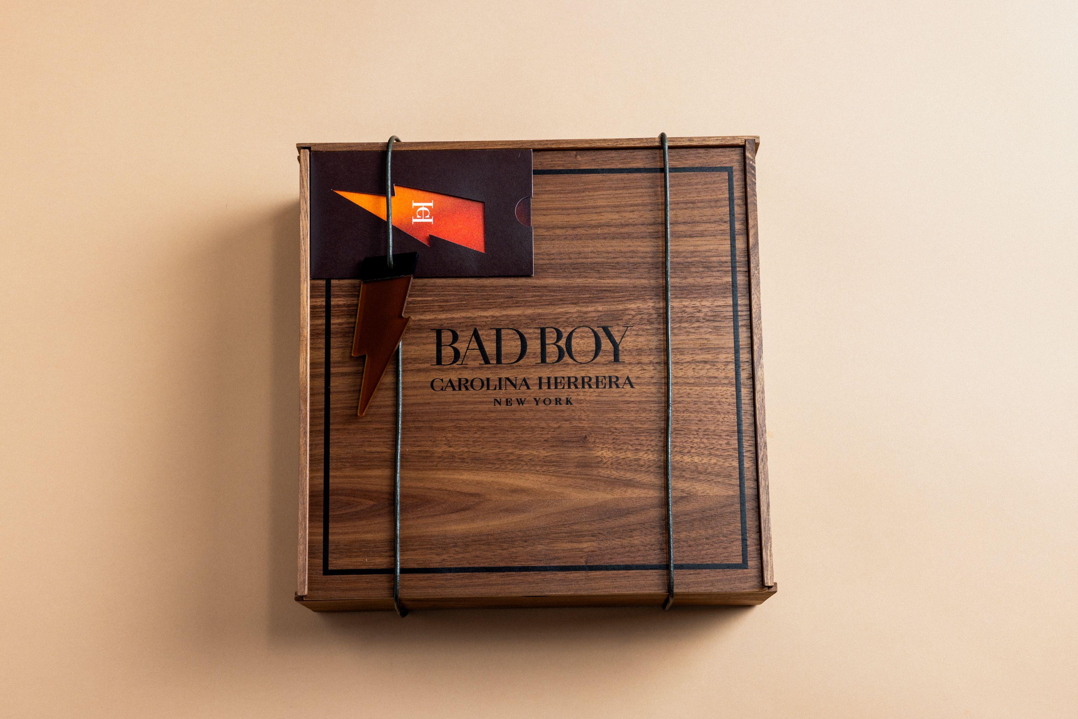 Carolina Hererra Bad Boy Fragrance wooden box with tic tac toe game set inside