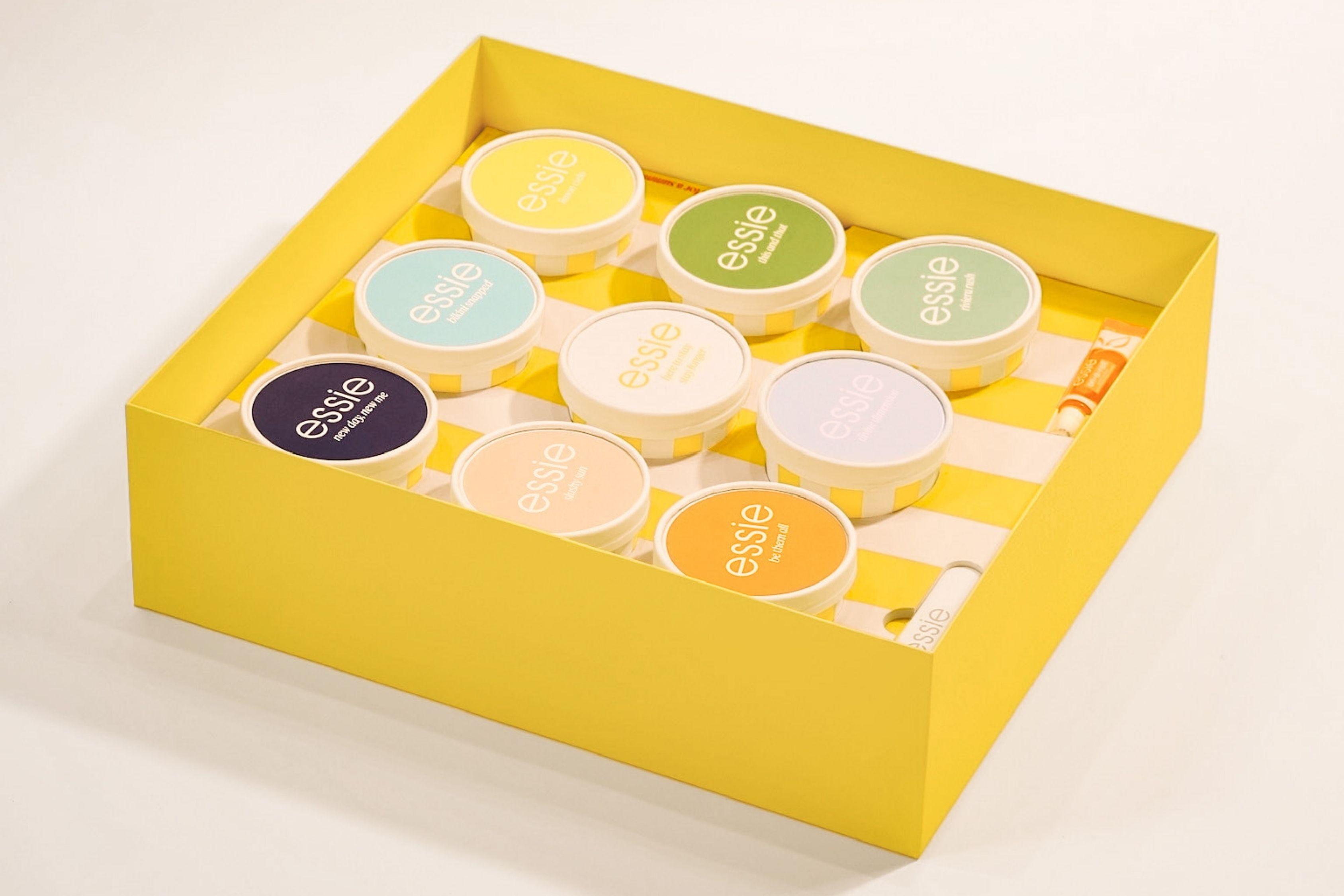 Essie summer Riviera Rush nail polish collection within ice cream boxes with backgammon set and branded newspaper