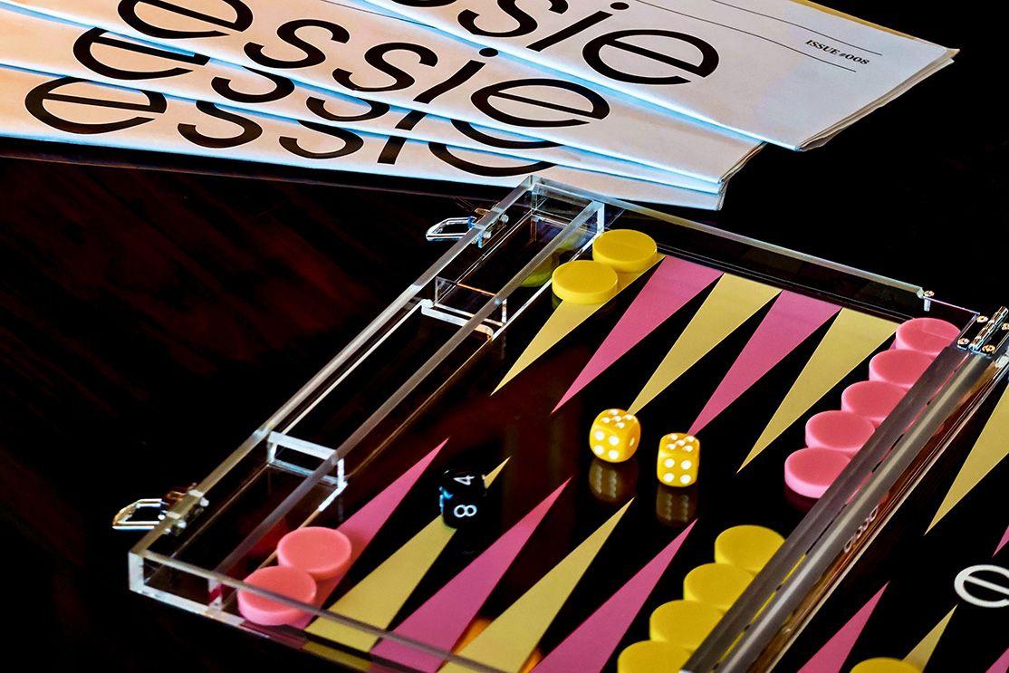 Essie summer Riviera Rush nail polish collection within ice cream boxes with backgammon set and branded newspaper