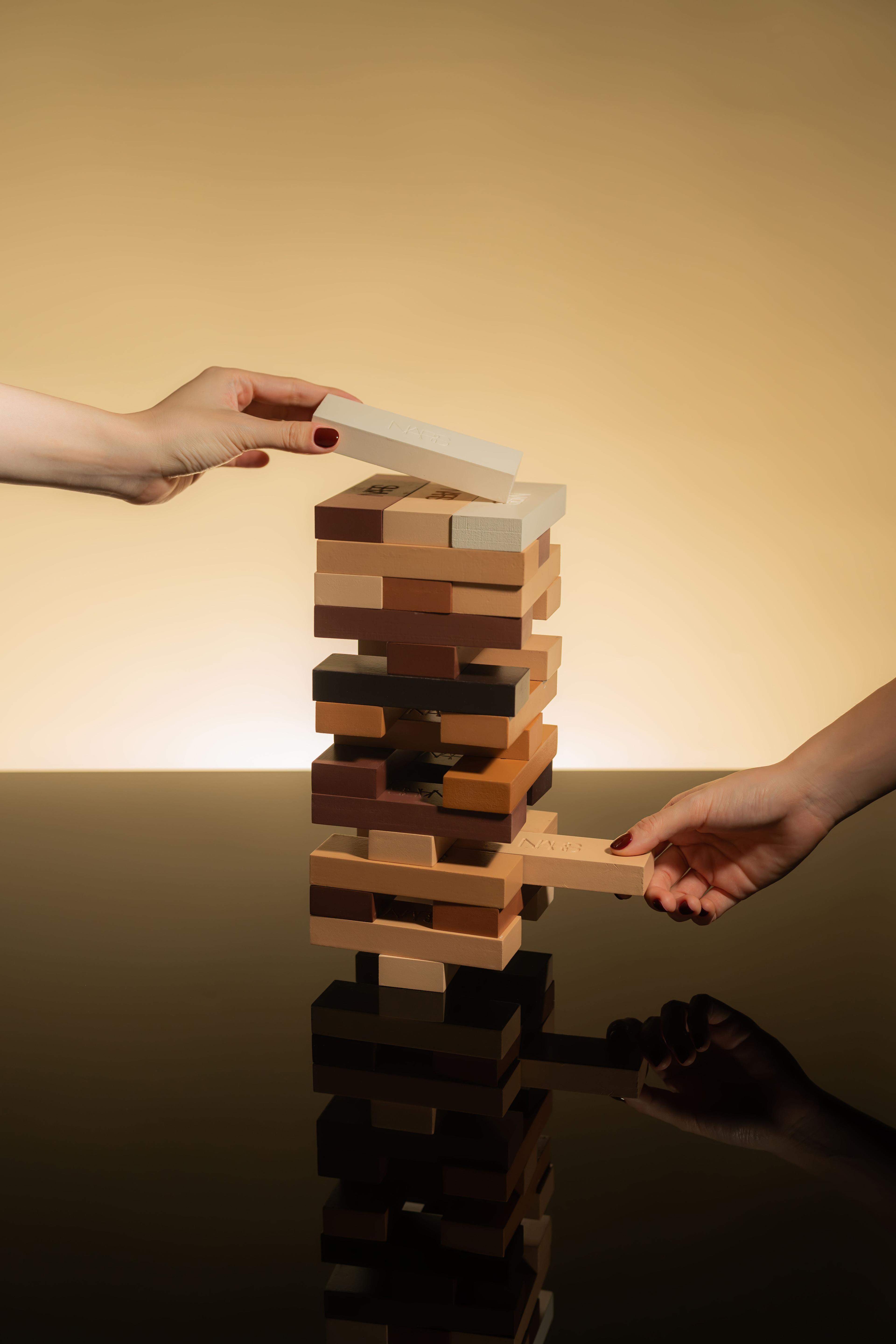 NARS complexion products, Light Reflecting Foundation and Natural Radiant Longwear, as jenga games for PR gifting