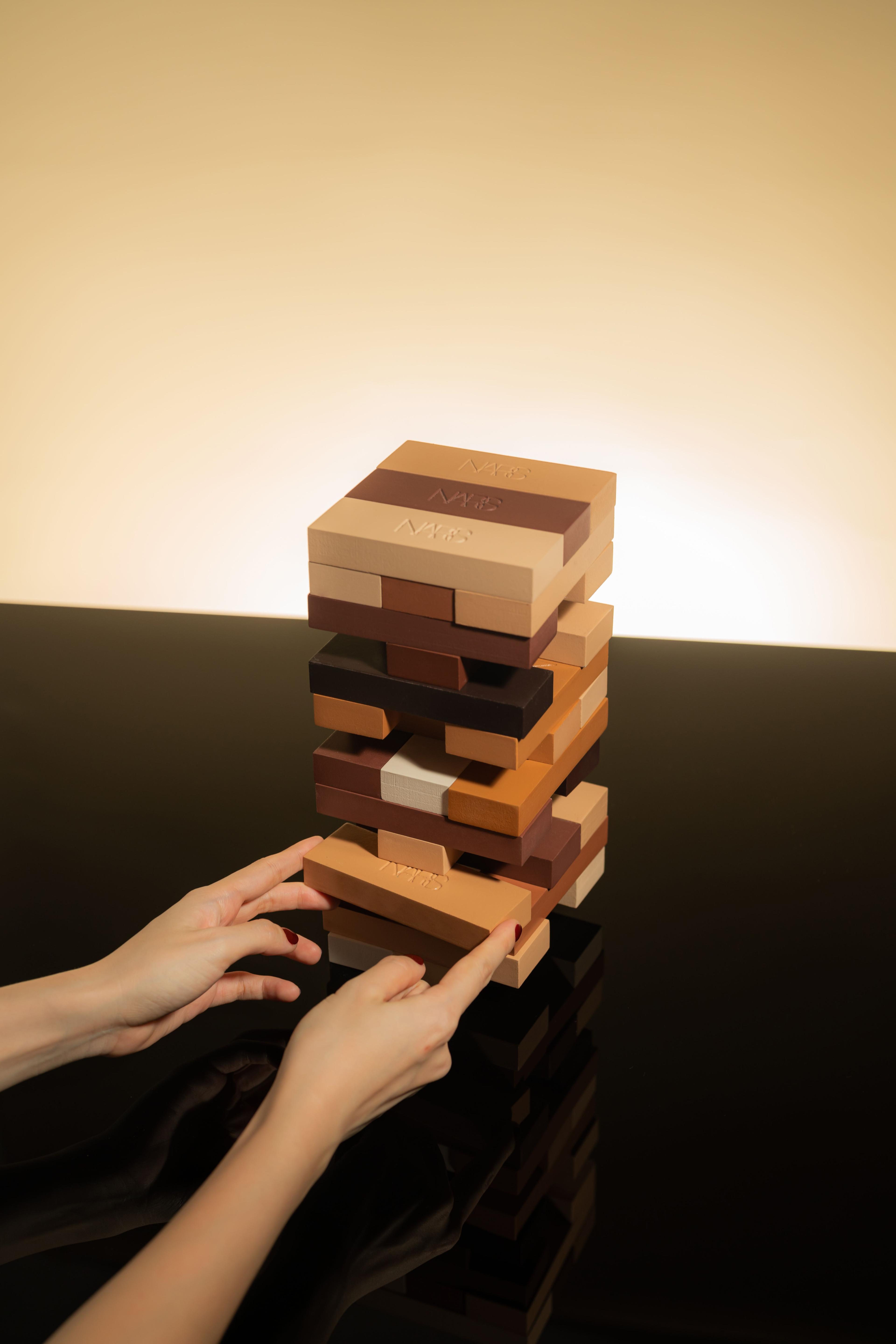 NARS complexion products, Light Reflecting Foundation and Natural Radiant Longwear, as jenga games for PR gifting