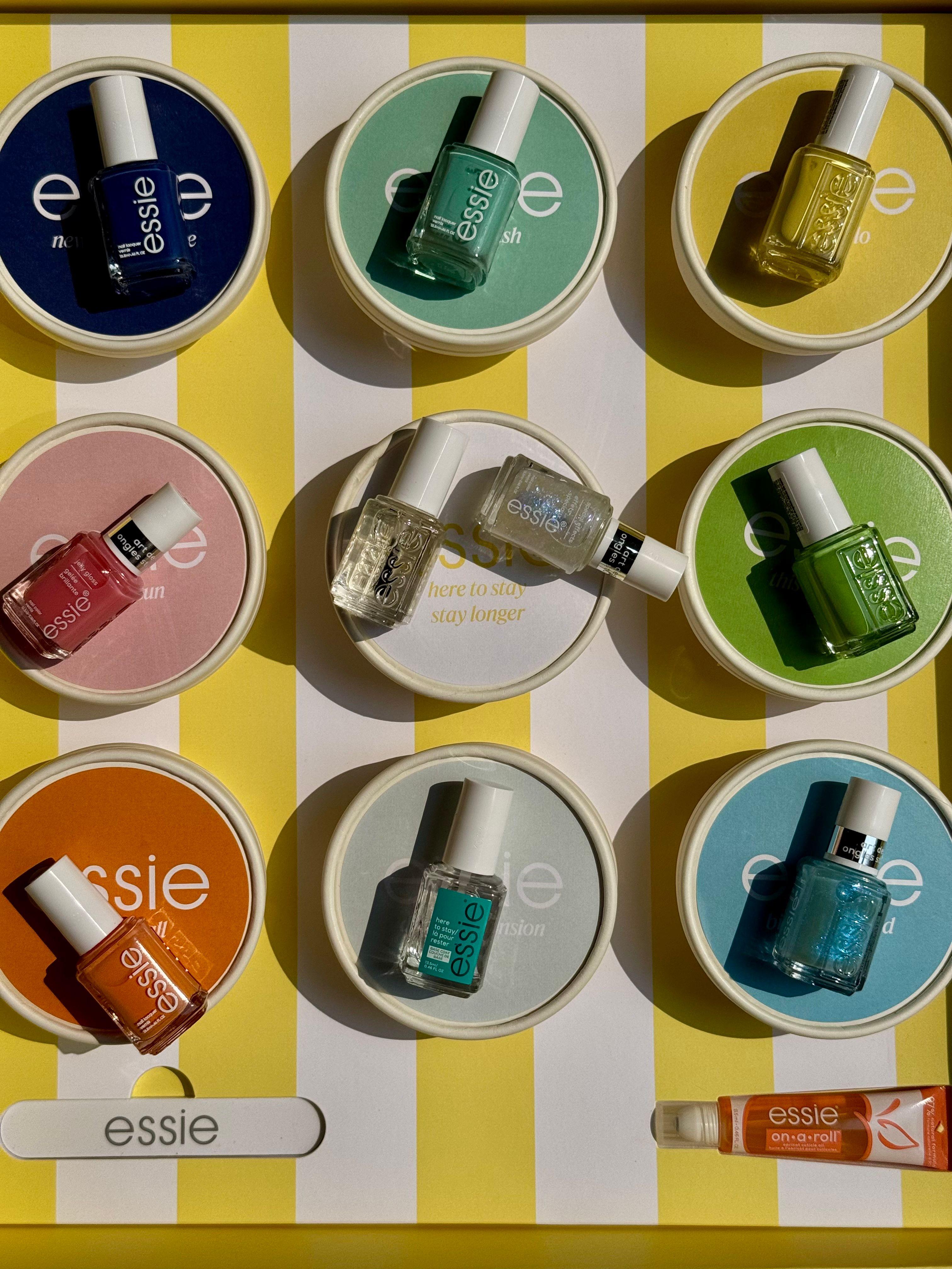 Essie summer Riviera Rush nail polish collection within ice cream boxes with backgammon set and branded newspaper