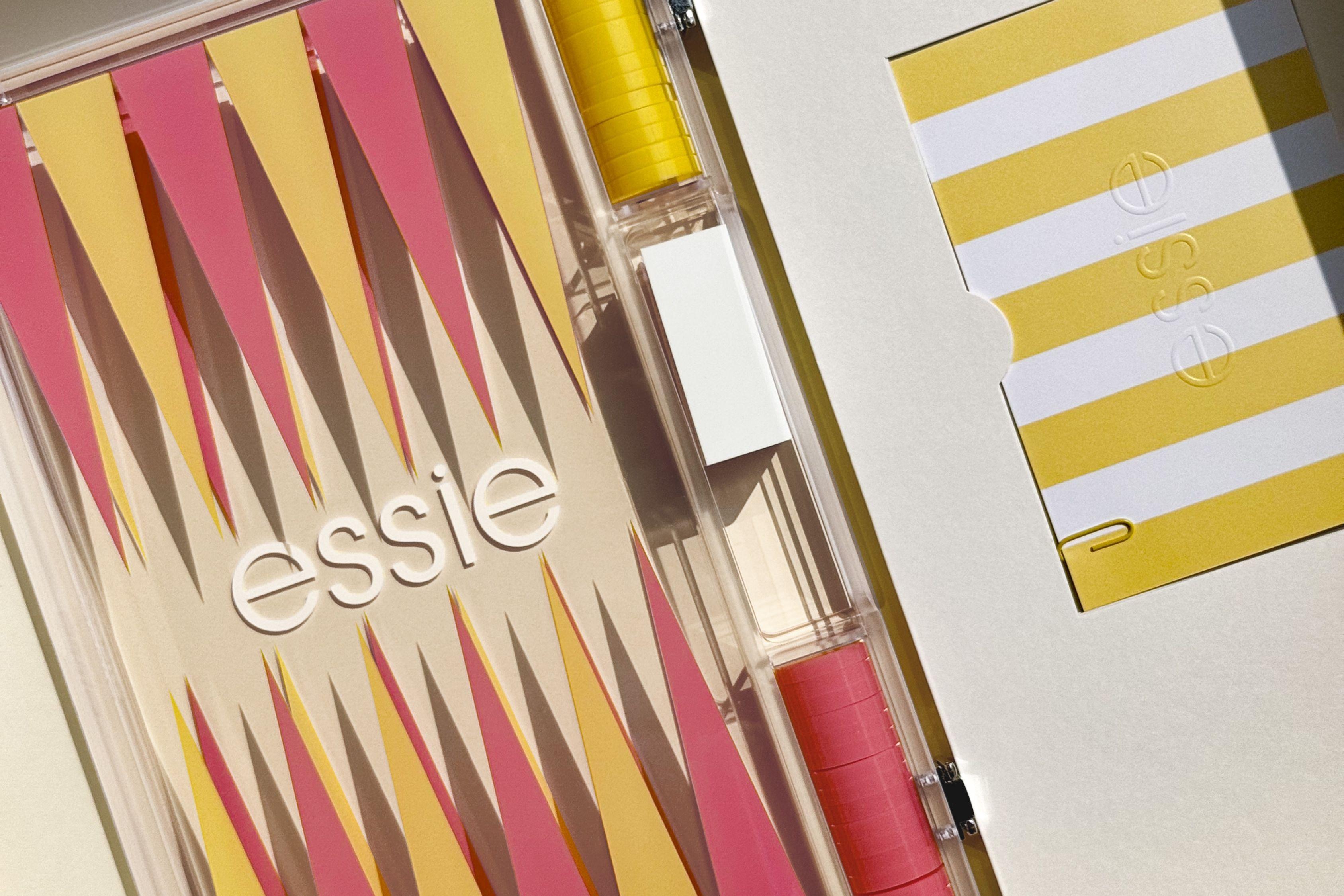 Essie summer Riviera Rush nail polish collection within ice cream boxes with backgammon set and branded newspaper