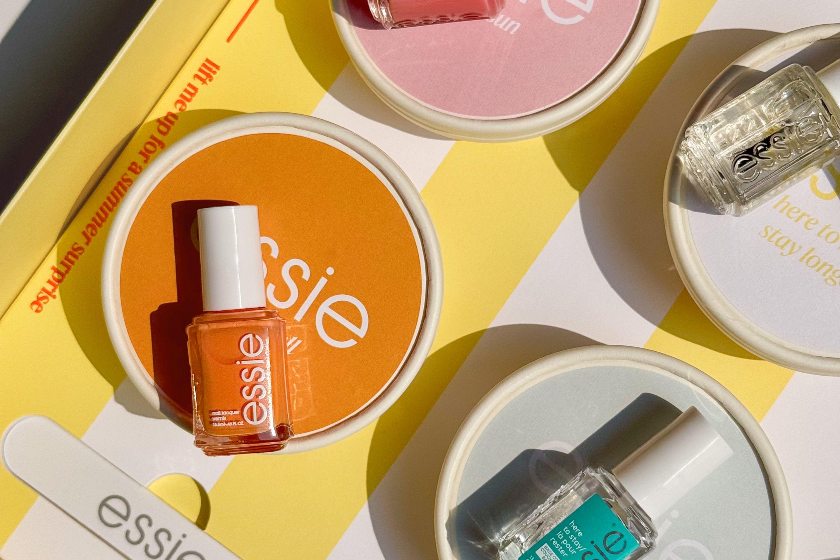 Essie summer Riviera Rush nail polish collection within ice cream boxes with backgammon set and branded newspaper