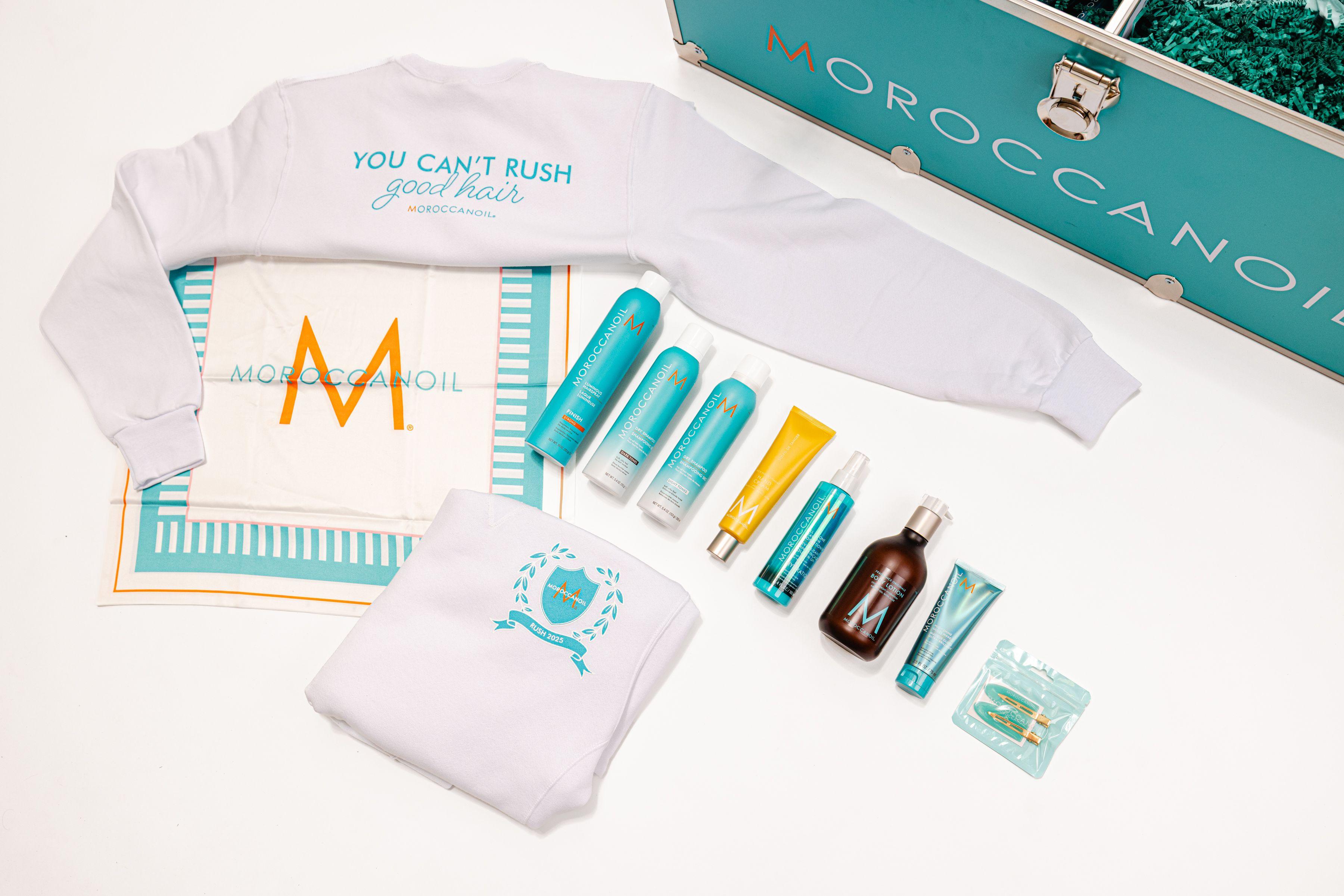 Moroccan Oil turquoise blue trunk with product for sorority rush campaign